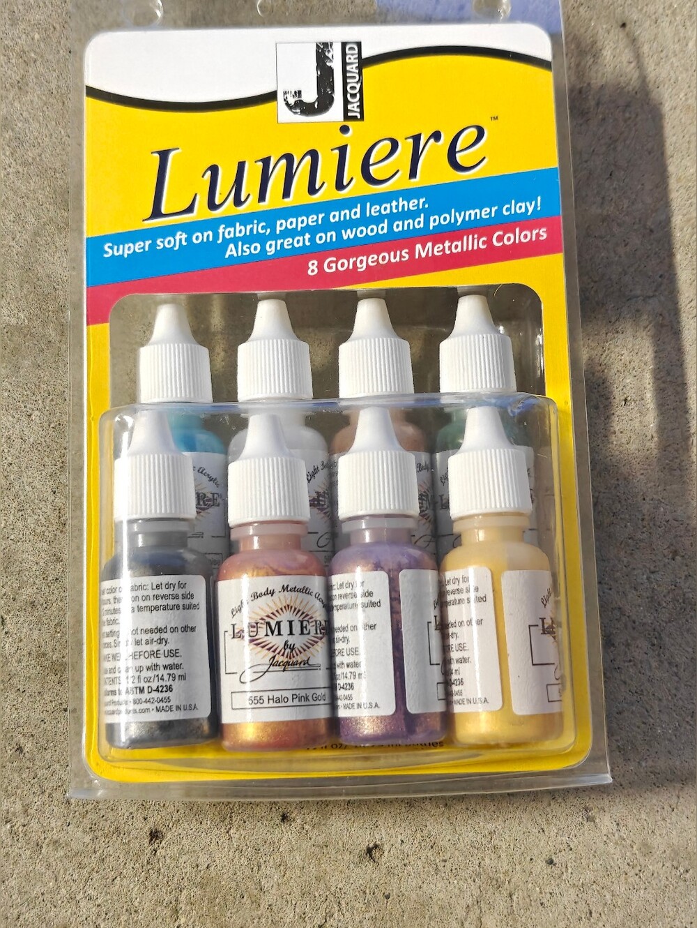 a Jacquard Lumiere Metallic Acrylic 8-Color Exciter Pack.